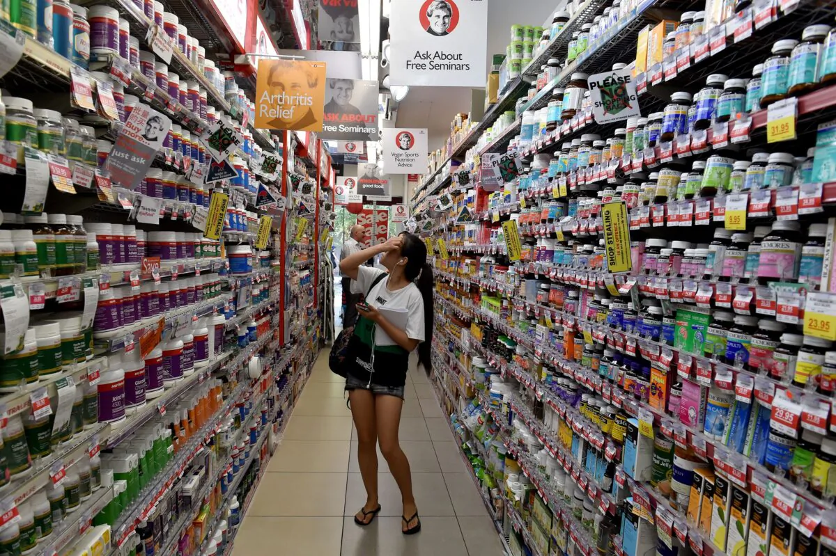 Customers browsing products at "Mr Vitamins," a chain of supplement outlets in Sydney, Australia, on Feb. 16, 2016. (Saeed Khan/AFP via Getty Images)