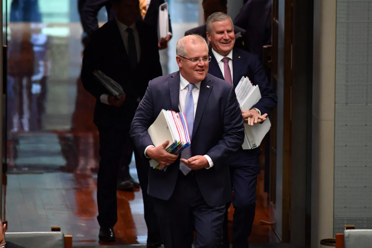 Prime Minister Scott Morrison and Deputy Prime Minister Michael McCormack arrive for Question Time at Parliament House in Canberra, Australia, on May 14, 2020. (Sam Mooy/Getty Images)