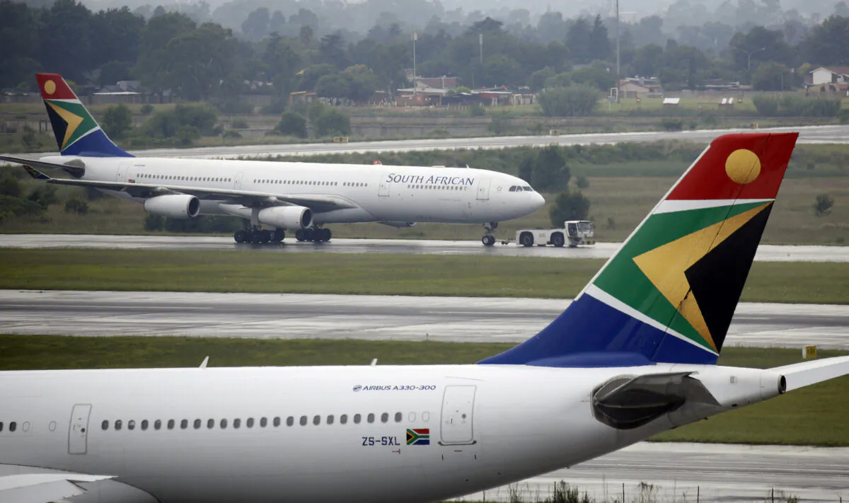 A South African Airways (SAA) plane is towed at O.R. Tambo International Airport in Johannesburg, South Africa, on Jan. 18, 2020. (Rogan Ward/Reuters)