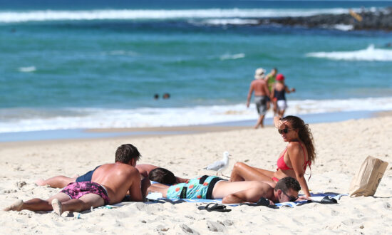 Queenslanders Frolic as Restrictions Ease