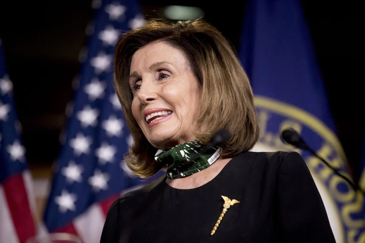 House Speaker Nancy Pelosi smiles during a news conference on Capitol Hill in Washington, on May 14, 2020. (AP Photo/Andrew Harnik)