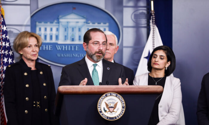 Health and Human Services Secretary Alex Azar speaks about the CCP virus, flanked by White House coronavirus response coordinator Debbie Birx (L) Vice President Mike Pence, and Centers for Medicare and Medicaid Services Administrator Seema Verma (R), at the White House on March 2, 2020. (Charlotte Cuthbertson/The Epoch Times)