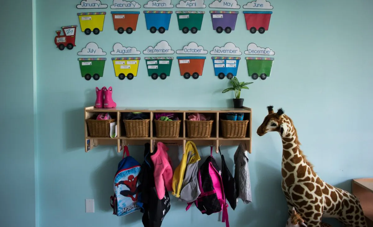 Children's backpacks and shoes are seen at a daycare in Canada, on May 29, 2018. (Darryl Dyck/The Canadian Press)