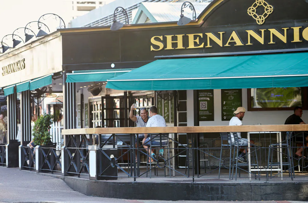 People sit and drink at Shenannigans Restaurant Bar on Mitchell St in Darwin, Australia on May 15, 2020 . (Shane Eecen/Getty Images)