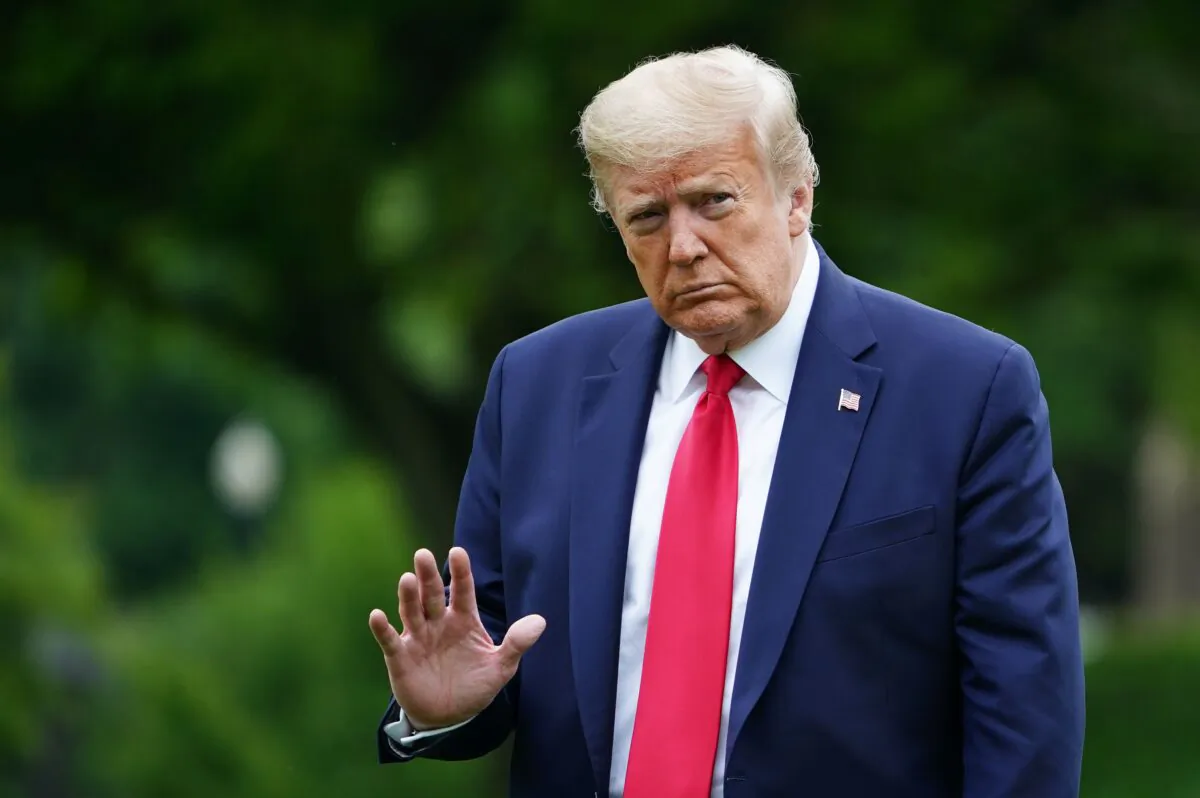 President Donald Trump walks across the South Lawn upon return to the White House on May 17, 2020. (Mandel Ngan/AFP/Getty Images)