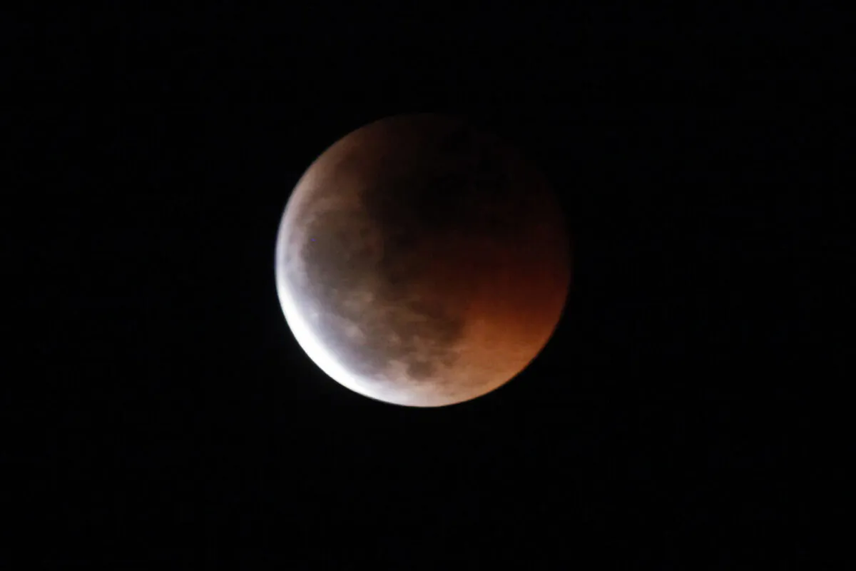 This picture taken on June 15, 2011 in the National Park of the volcano Teide (3718m of altitude) shows the moon during a lunar eclipse, on the Spanish canary island of Tenerife. (DESIREE MARTIN/AFP via Getty Images)