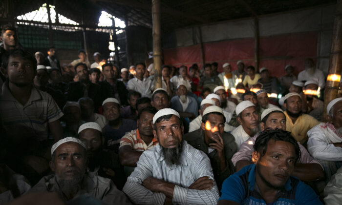 Rohingya refugees watch ICJ proceedings at a restaurant in a refugee camp in Cox's Bazar, Bangladesh, on Dec. 12, 2019. (Allison Joyce/Getty Images)