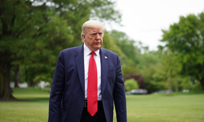 U.S. President Donald Trump walks across the South Lawn upon return to the White House in Washington on May 17, 2020. (Mandel Ngan/AFP via Getty Images)