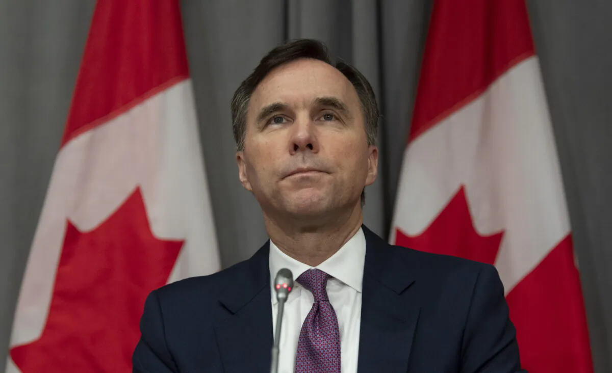 Minister of Finance Bill Morneau listens to a question during a news conference Friday May 1, 2020 in Ottawa. (Adrian Wyld/THE CANADIAN PRESS)