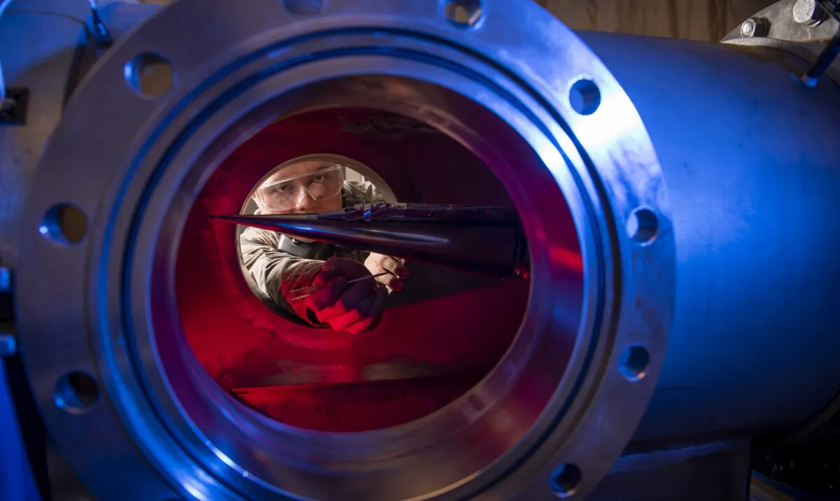 Cadet 2nd Class Eric Hembling uses a Ludwieg Tube to measure the pressures, temperatures, and flow field of various basic geometric and hypersonic research vehicles at Mach 6 in The United States Air Force Academy's Department of Aeronautics, in Colorado Springs, Colo., on Jan. 31, 2019. (Joshua Armstrong/U.S. Air Force Academy via AP)