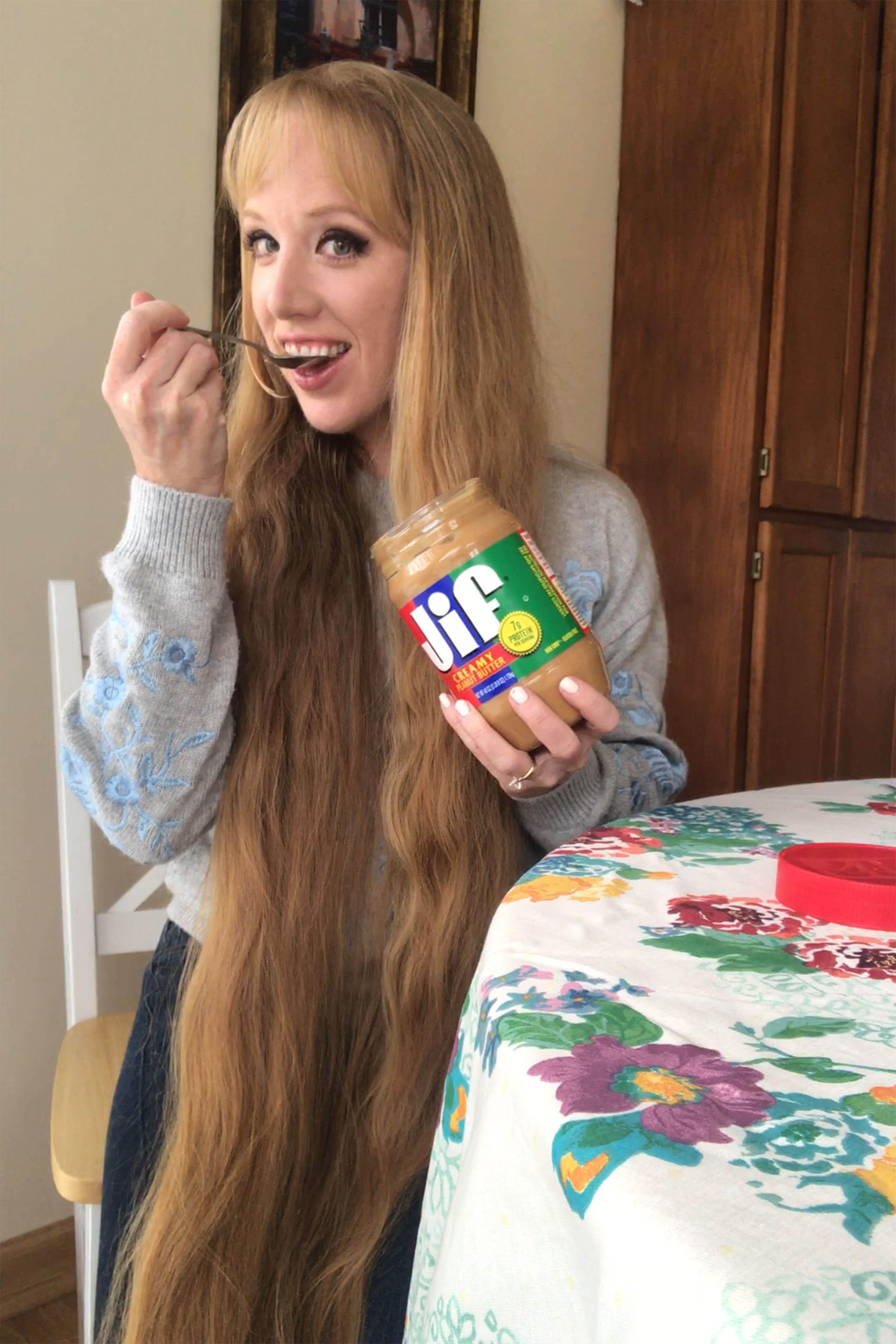 Woman With Ankle-Length Hair Dubbed the 'Real-Life Rapunzel,' Claims Peanut  Butter Is Secret to Her Mane
