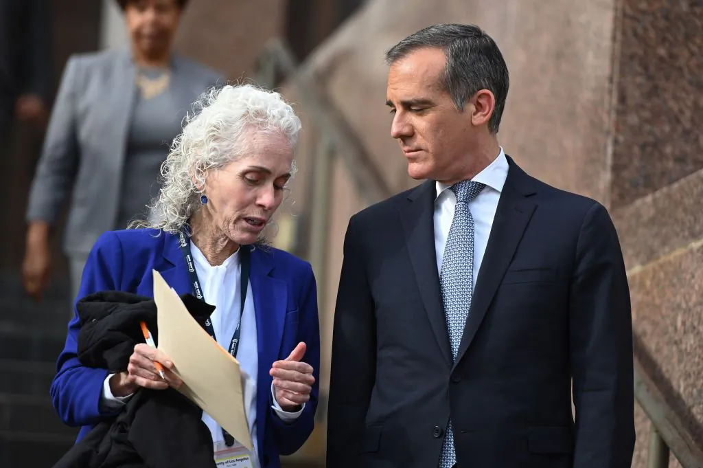 Los Angeles County Public Health director Barbara Ferrer (L) and Mayor Eric Garcetti (R) speak as they arrive for a press conference in Los Angeles on March 4, 2020. (Robyn Beck/AFP via Getty Images)