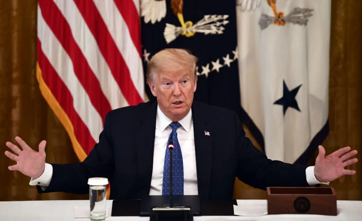 President Donald Trump speaks during a meeting with his cabinet in the Cabinet Room of the White House in Washington, on May 19, 2020. (Brendan Smialowski/AFP via Getty Images)