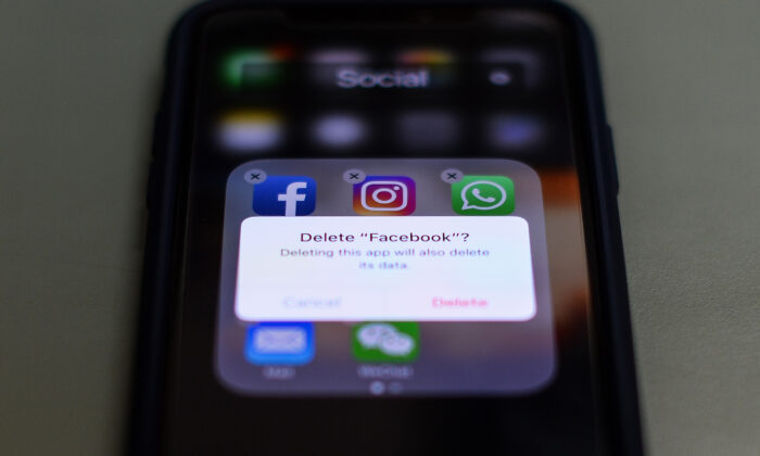 This photo illustration taken on March 27, 2018, shows apps for Facebook, Instagram, Twitter and other social networks on a smartphone in the Indian capital New Delhi. (Chandan Khanna/AFP via Getty Images)
