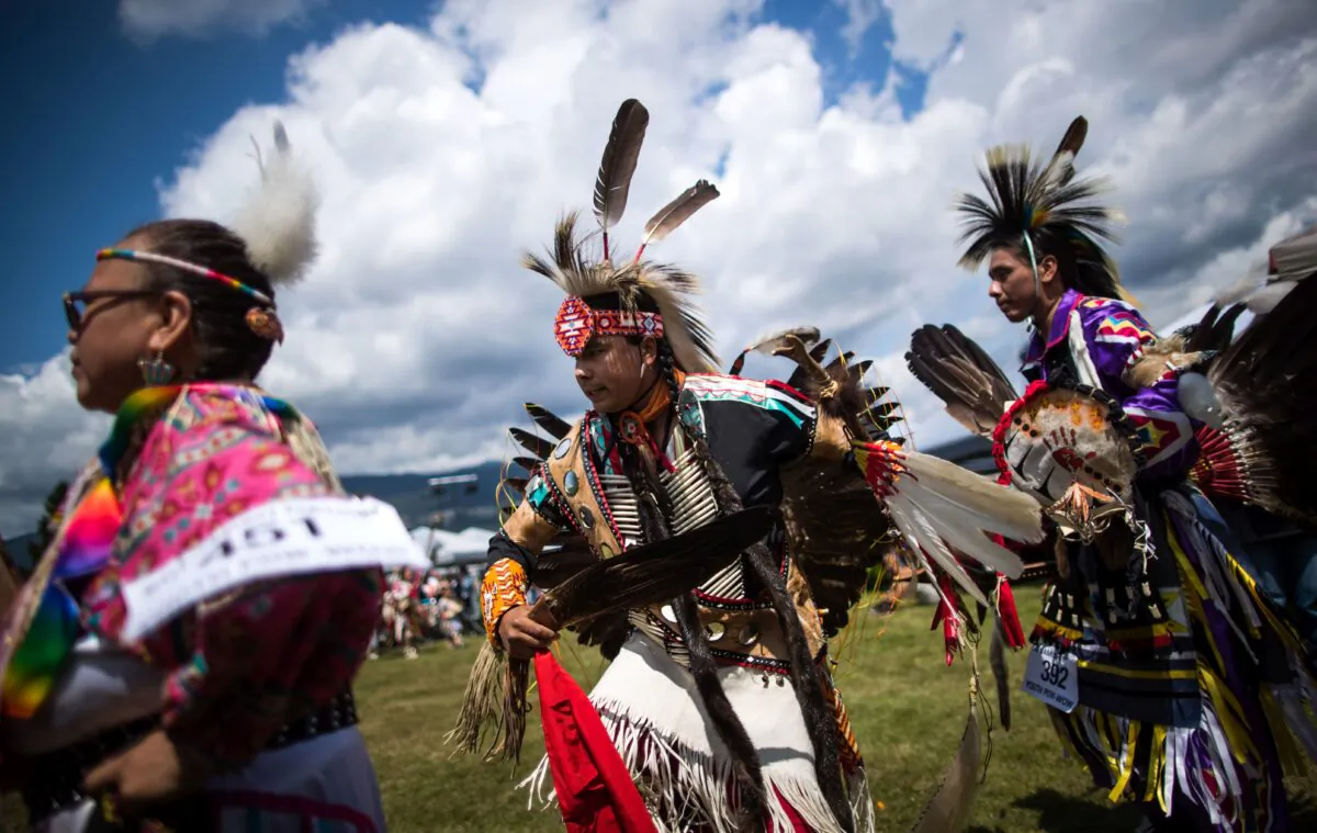 Young dancers dressed in regalia participate in the 32nd annual Squamish Nation Youth Powwow in West Vancouver on July 14, 2019. Given a real leg up, Indigenous youth could prosper and escape Canada’s ever-growing Indigenous underclass. (The Canadian Press/Darryl Dyck)