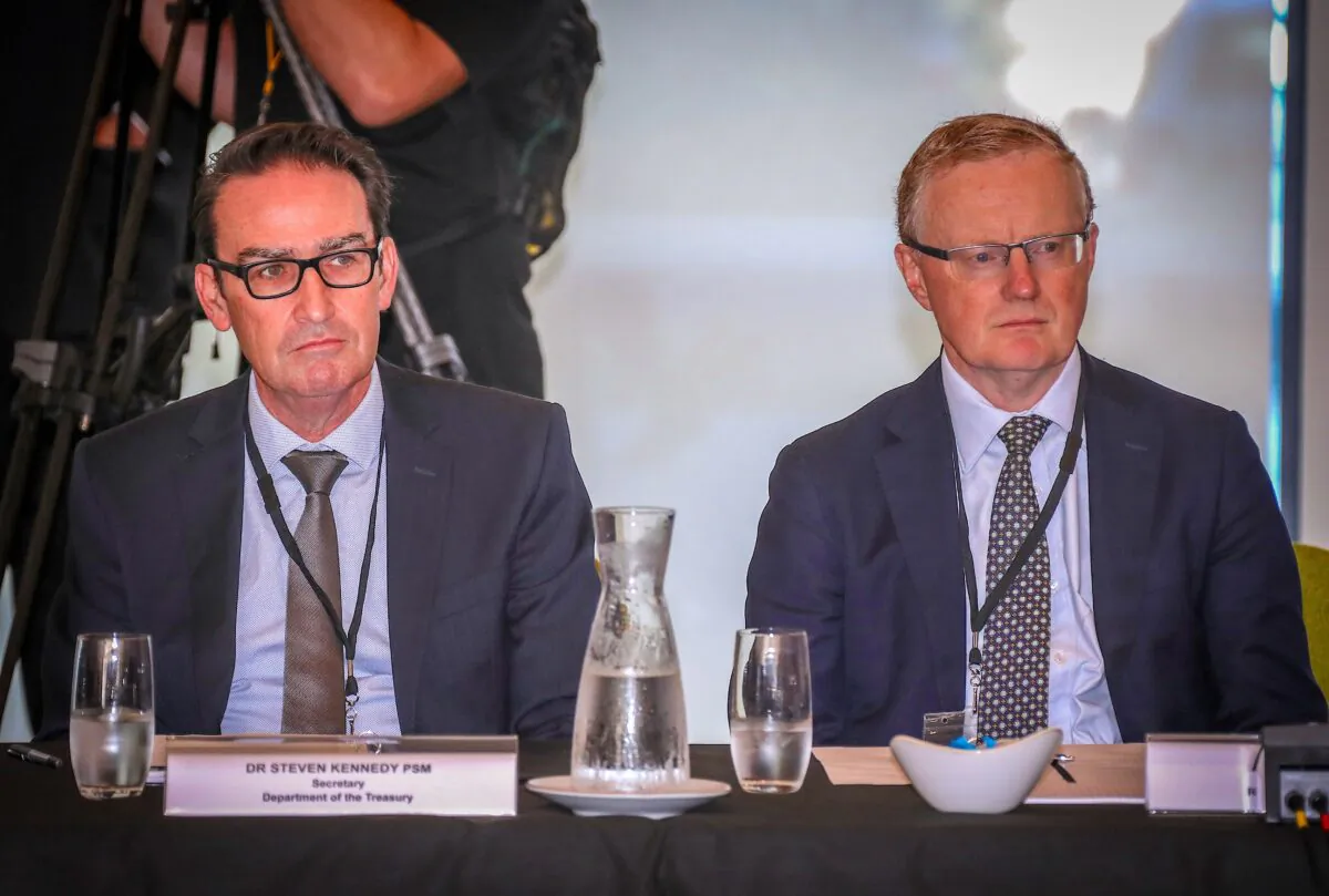 Philip Lowe, Governor of the Reserve Bank of Australia, sits next to Steven Kennedy (left), Secretary to the Department of Treasury, during the Meeting of the Council of Australian Governments (COAG) at Parramatta Stadium in western Sydney on March 13, 2020. (David Gray/Getty Images)