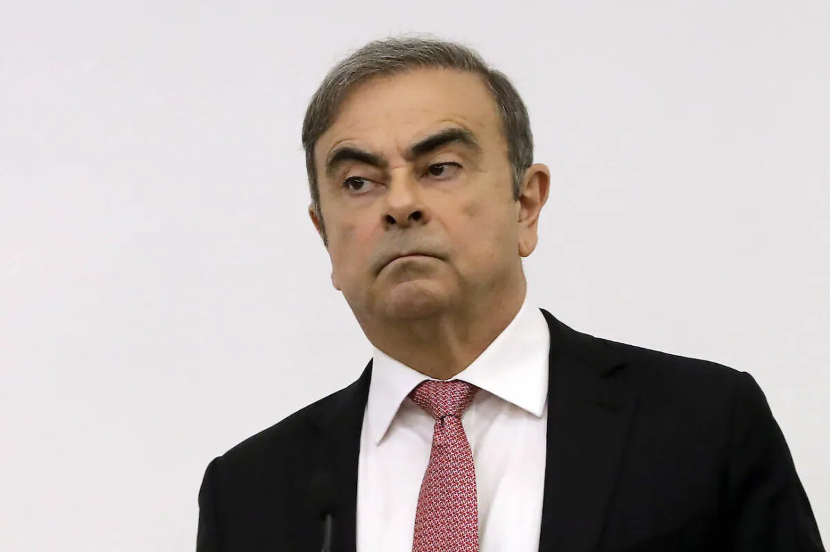 Former Renault-Nissan boss Carlos Ghosn looks on before addressing a large crowd of journalists on his reasons for dodging trial in Japan, where he is accused of financial misconduct, at the Lebanese Press Syndicate in Beirut on Jan. 8, 2020. (Joseph Eid/AFP via Getty Images)