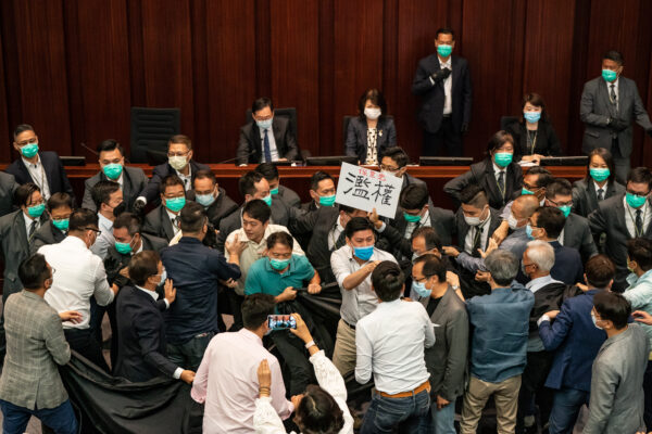 Lawmakers Scuffle In Hong Kong Amid The Coronavirus Pandemic