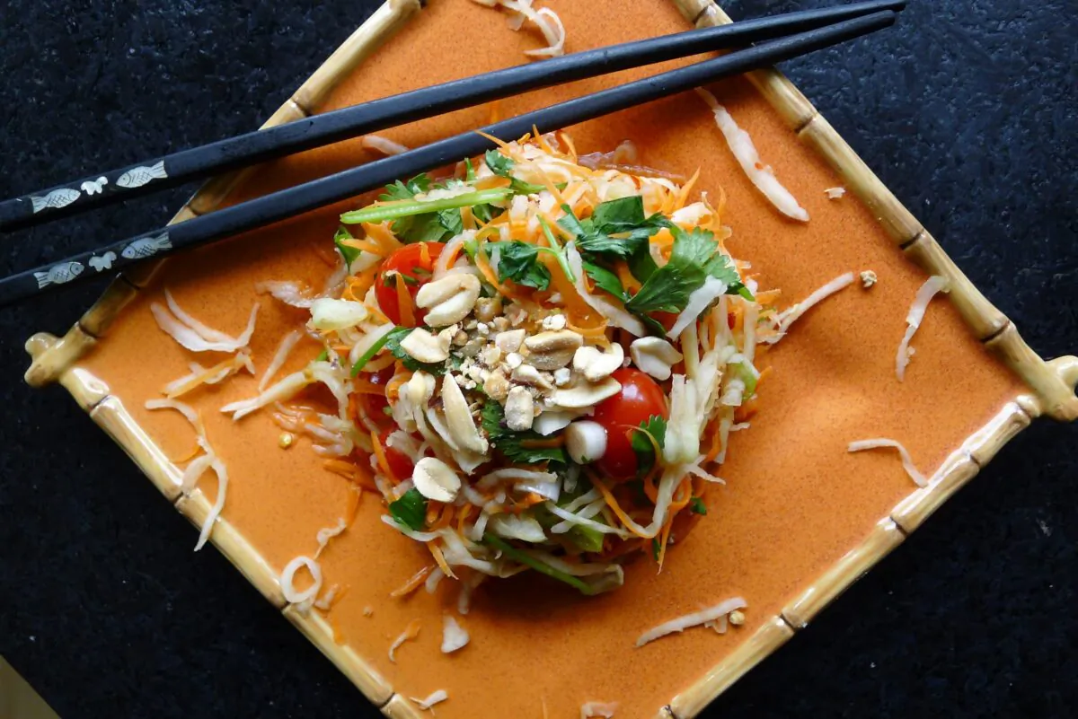 Kohl som, loosely translated to "Thai-style sour kohlrabi," swaps som tom's shredded green papaya for kohlrabi. (Ari LeVaux)