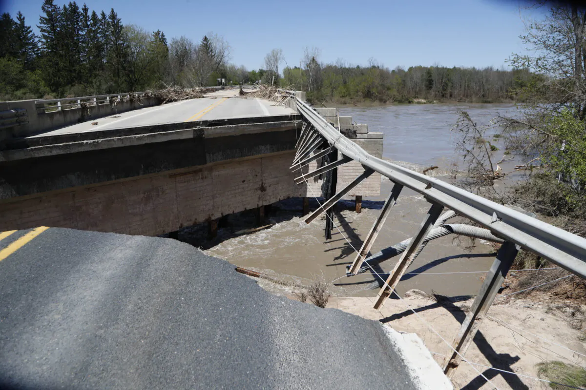 Damage on one of two North M-30 bridges in Edenville, Mich., on May 20, 2020. (Carlos Osorio/AP Photo)