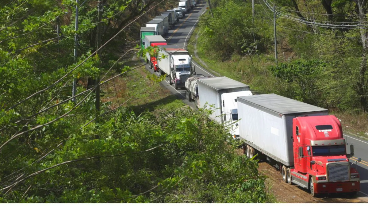 Trucks are parked in a queue at the border between Costa Rica and Nicaragua, after Nicaragua's government closed the border for freight traffic, during the outbreak of the CCP virus (COVID-19), in Penas Blancas, Costa Rica on May 21, 2020. (Juan Carlos Ulate/Reuters)