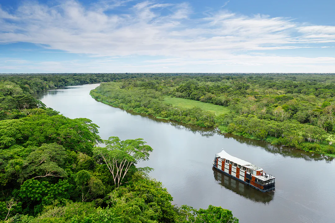 The Amazon river, like a highway cutting the through dense jungle, connects villages and towns. (Courtesy of Aqua Expeditions)