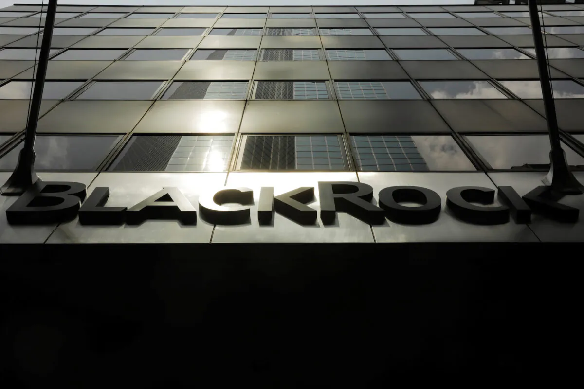 A sign for BlackRock Inc. hangs above their building in New York on July 16, 2018. (Lucas Jackson/Reuters)