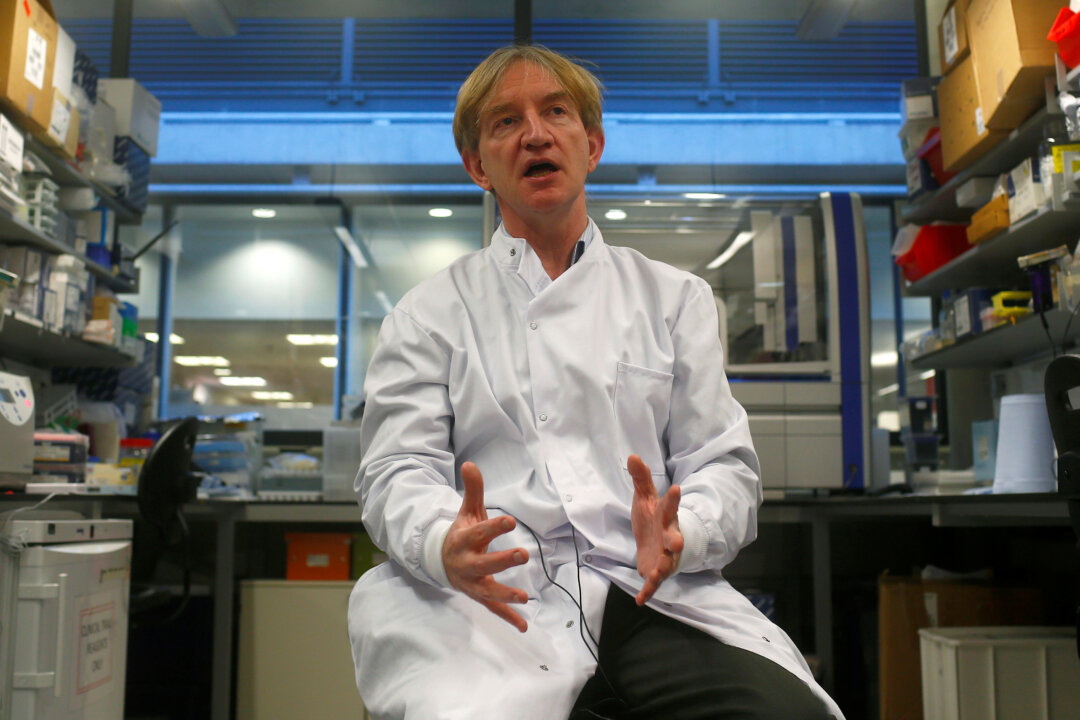 Professor Adrian Hill speaks to members of the media at the Jenner Institute in Oxford, UK, on Jan. 16, 2015. (Eddie Keogh/Reuters)