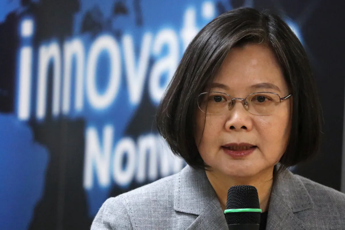 Taiwanese President Tsai Ing-wen speaks at a non-woven filter fabric factory, where the fabric is used to make surgical masks, in Taoyuan, Taiwan, March 30, 2020. (Ann Wang/Reuters)