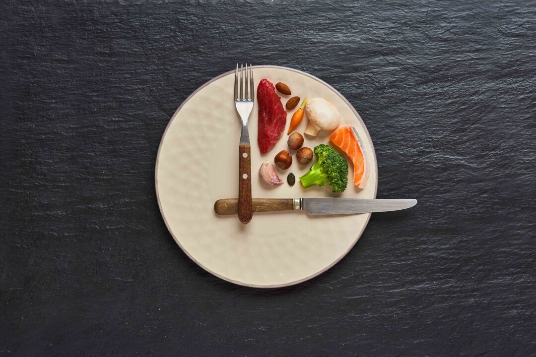 Leaving lengths of time between meals can help restrict calorie intake—unless you overeat in subsequent meals. (Marcin Malicki/Shutterstock)