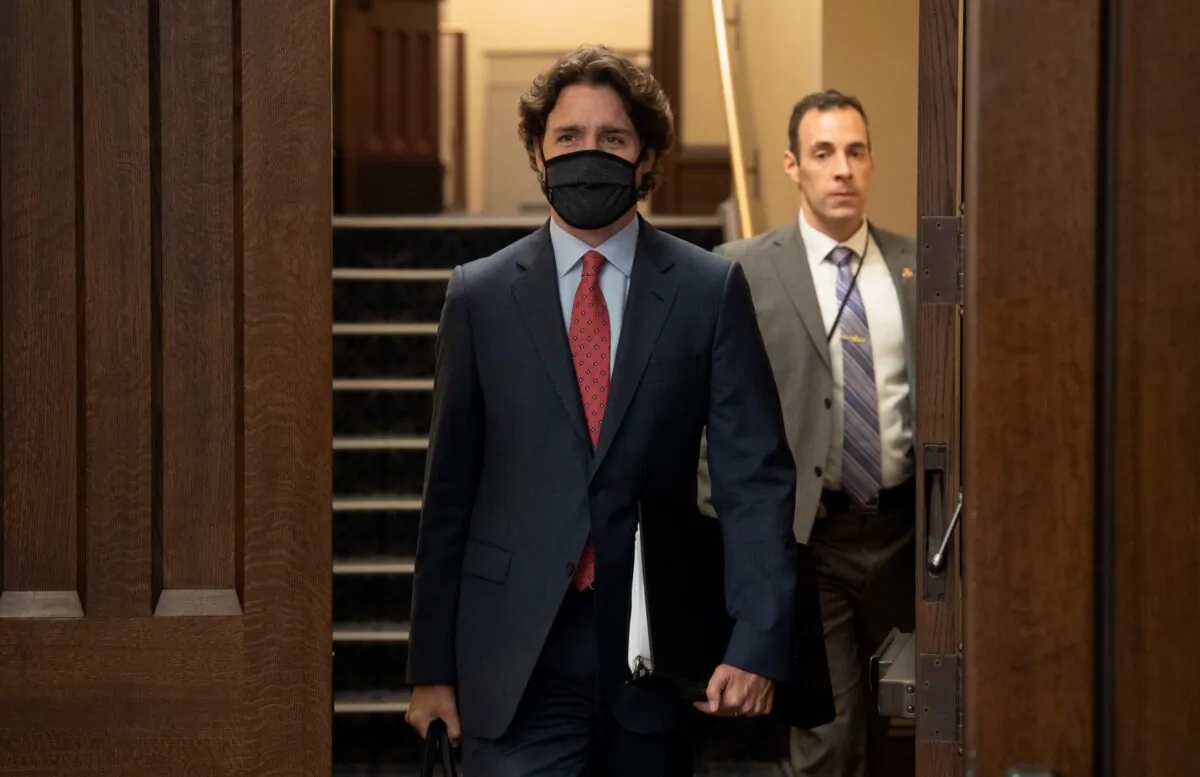 Prime Minister Justin Trudeau makes his way to Question Period in the House of Commons on May 26, 2020 in Ottawa. (Adrian Wyld/THE CANADIAN PRESS)