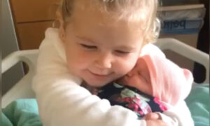 Video: Toddler Falls in Love With Baby Sister on Meeting Her for the First Time
