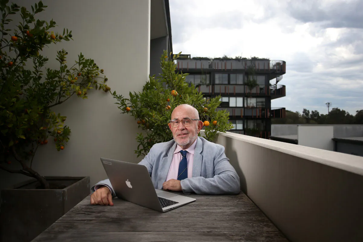 Mark Halsted, a teacher of 38 years, isolates at his home and teaching his class online, April 29, 2020 in Sydney, Australia.  (Lisa Maree Williams/Getty Images)