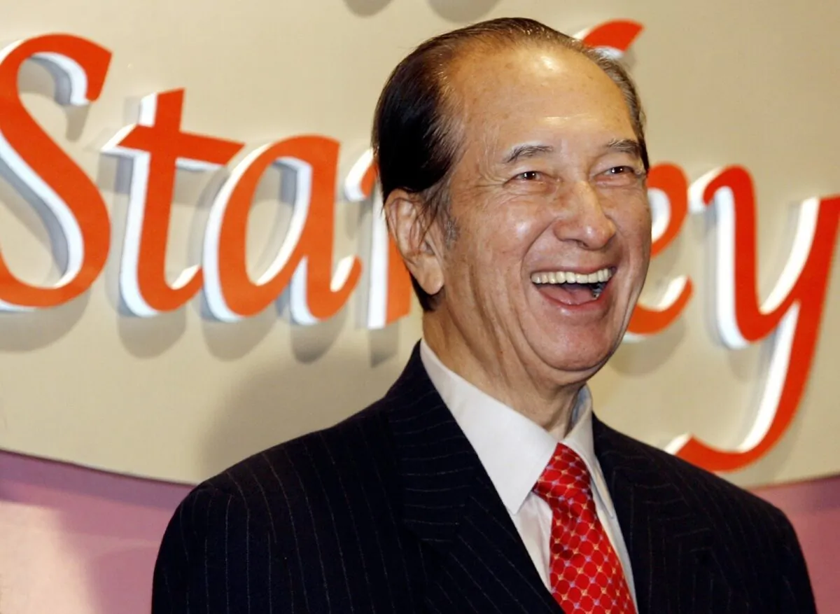 Macao tycoon Stanley Ho smiles during a party to celebrate his 85th birthday in Hong Kong on Nov. 20, 2006. (Vincent Yu/File Photo via AP)
