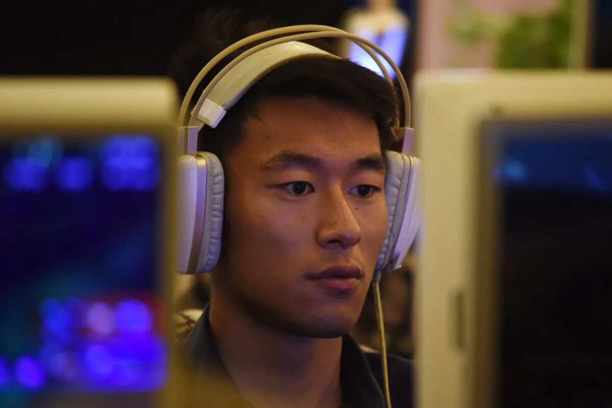 A man uses a computer in an internet cafe in Beijing, China, on June 1, 2017. (GREG BAKER/AFP via Getty Images)