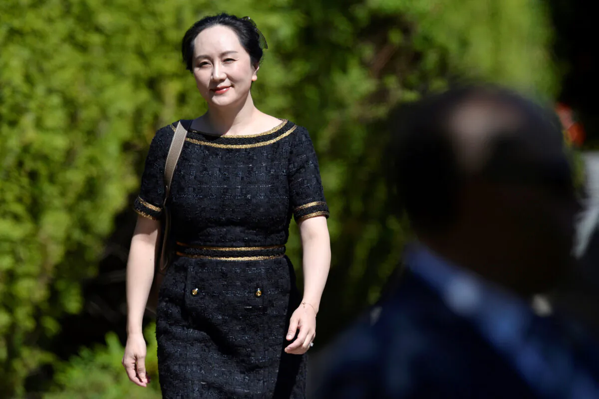 Huawei Technologies Chief Financial Officer Meng Wanzhou leaves her home to attend a court hearing in Vancouver, May 27, 2020. (Jennifer Gauthier/Reuters)