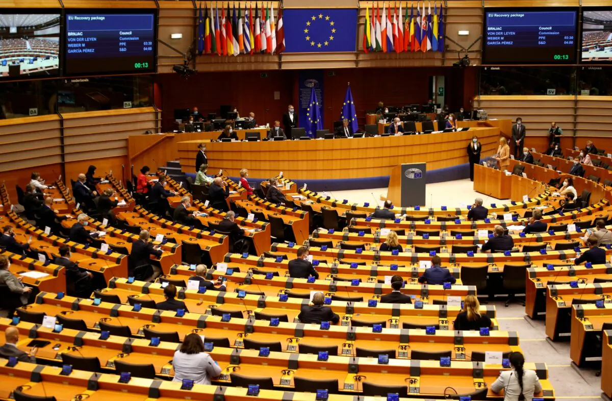 Members of the European Parliament are seen during a plenary session on a new proposal for the EU's joint 2021-27 budget and an accompanying Recovery Instrument to kickstart economic activity in the bloc ravaged by the CCP virus outbreak, in Brussels on May 27, 2020. (Johanna Geron/Reuters)
