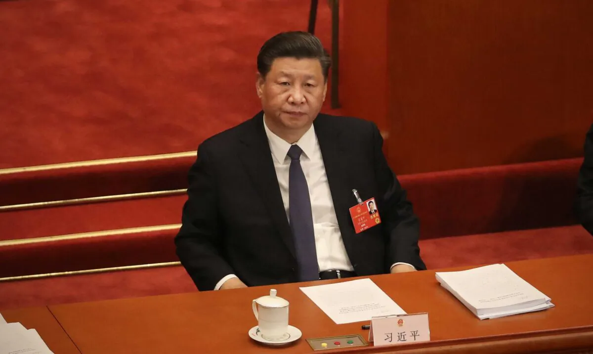 Chinese leader Xi Jinping attends the opening of the rubber-stamp National People's Congress at The Great Hall of the People in Beijing, China, on May 22, 2020. (Andrea Verdelli/Getty Images)
