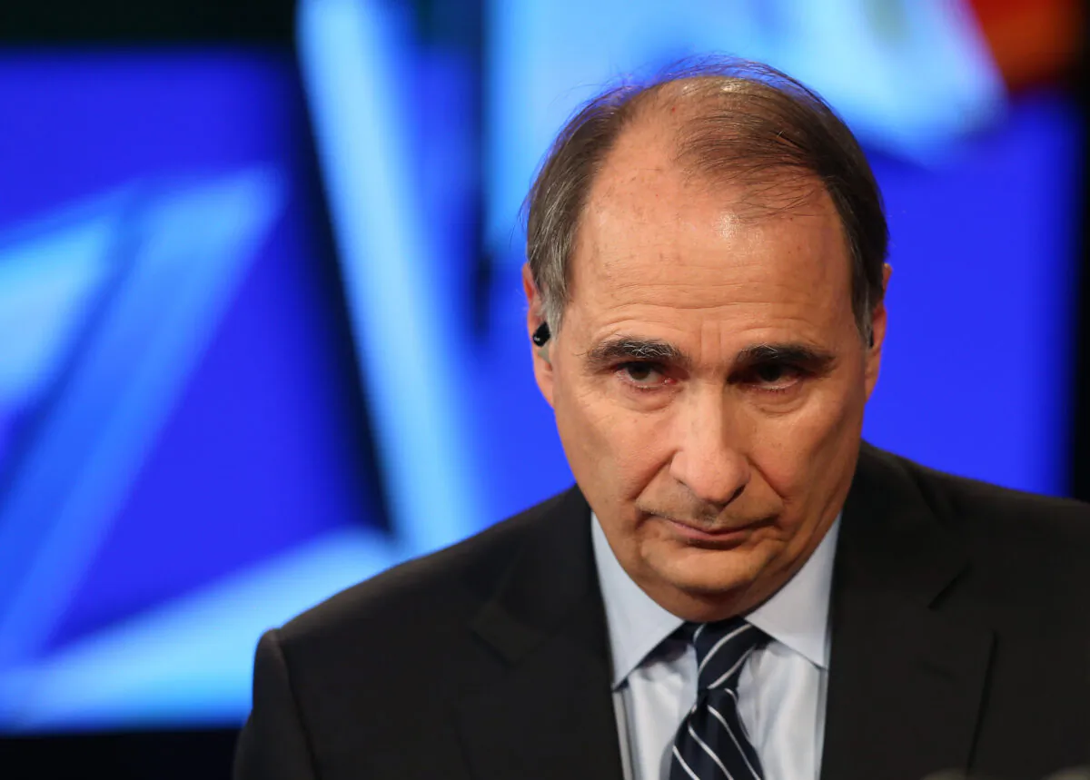 Political analyst David Axelrod attends a Democratic presidential debate at Wynn Las Vegas in Las Vegas, Nev., on Oct. 13, 2015. Axelrod has accused President Donald Trump of ruthlessness in wishing to reopen the country. (Joe Raedle/Getty Images)