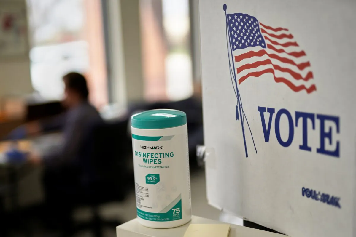 File photo of a voting booth. (Nati Harnik/AP Photo)