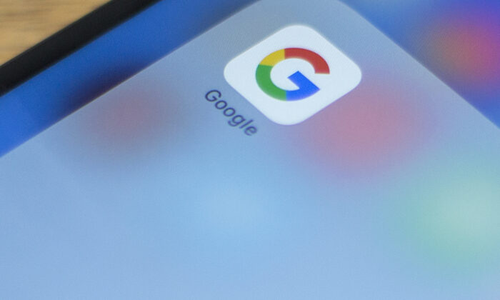  Google logo is seen on a phone in this photo illustration in Washington on July 10, 2019. (Alastair Pike/AFP via Getty Images)