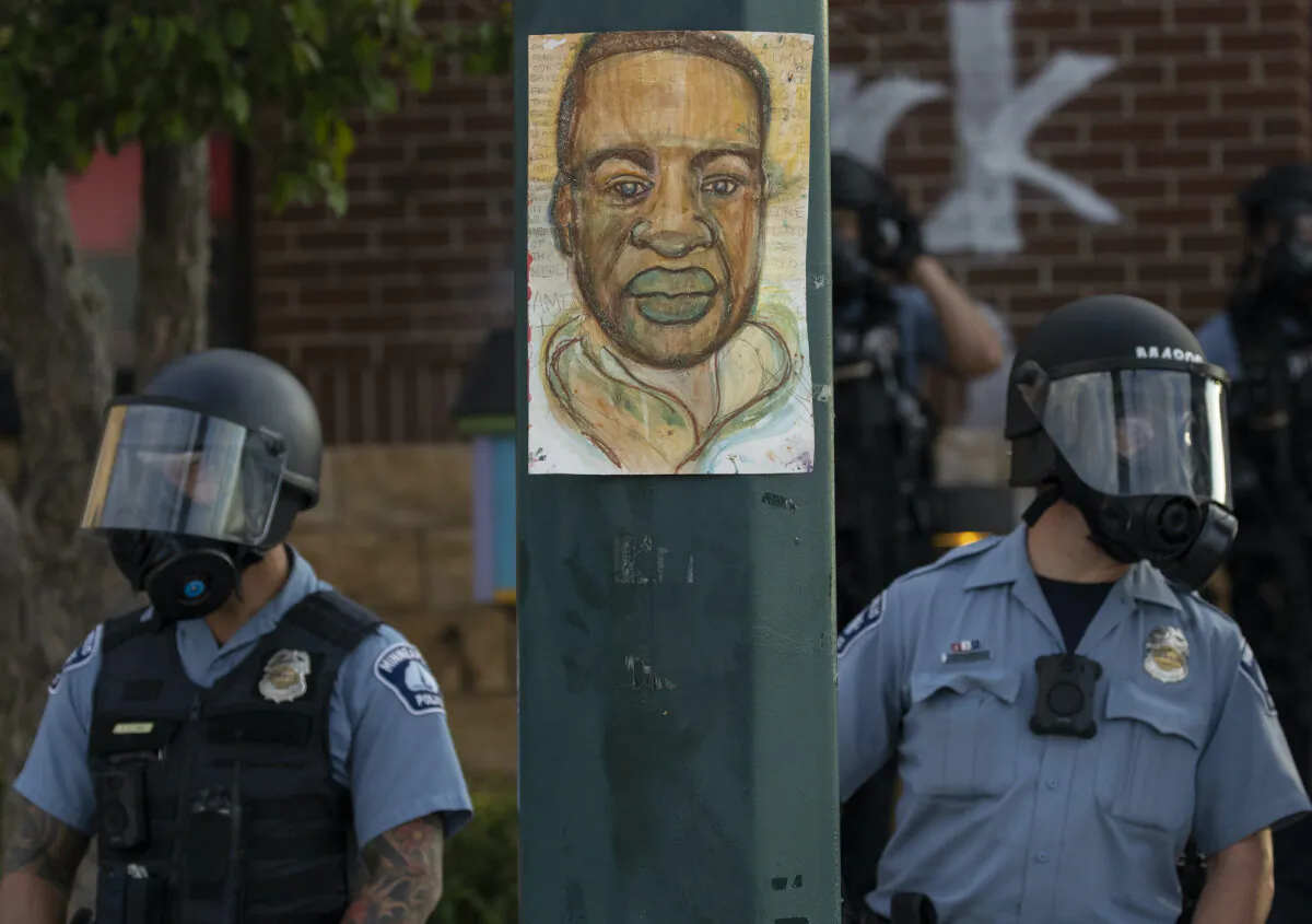 Minnesota police stand outside the department's 3rd Precinct in Minneapolis on May 27, 2020. (Carlos Gonzalez/Star Tribune/AP)