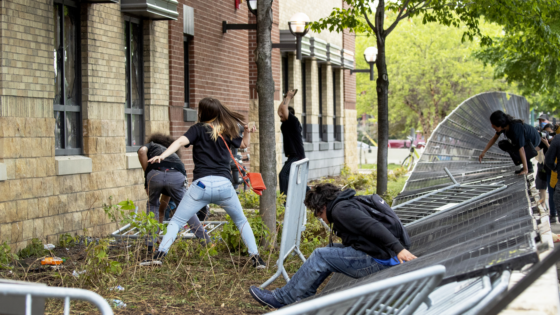 Protesters damage properties
