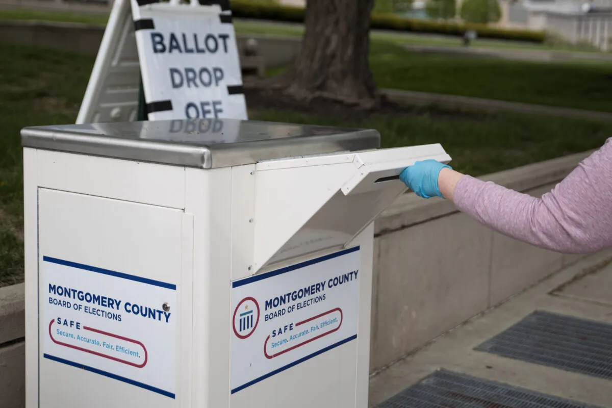 An Ohio voter drops off their ballot at the Board of Elections in Dayton, Ohio, on April 28, 2020. (Megan Jelinger/AFP via Getty Images)