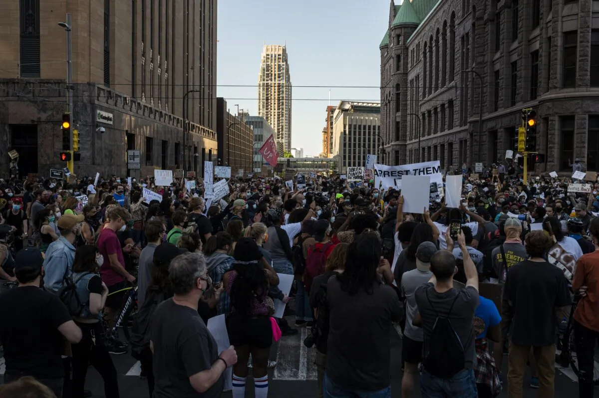 Protesters march through the street in downtown Minneapolis, Minn. on May 28, 2020. (Stephen Maturen/Getty Images)