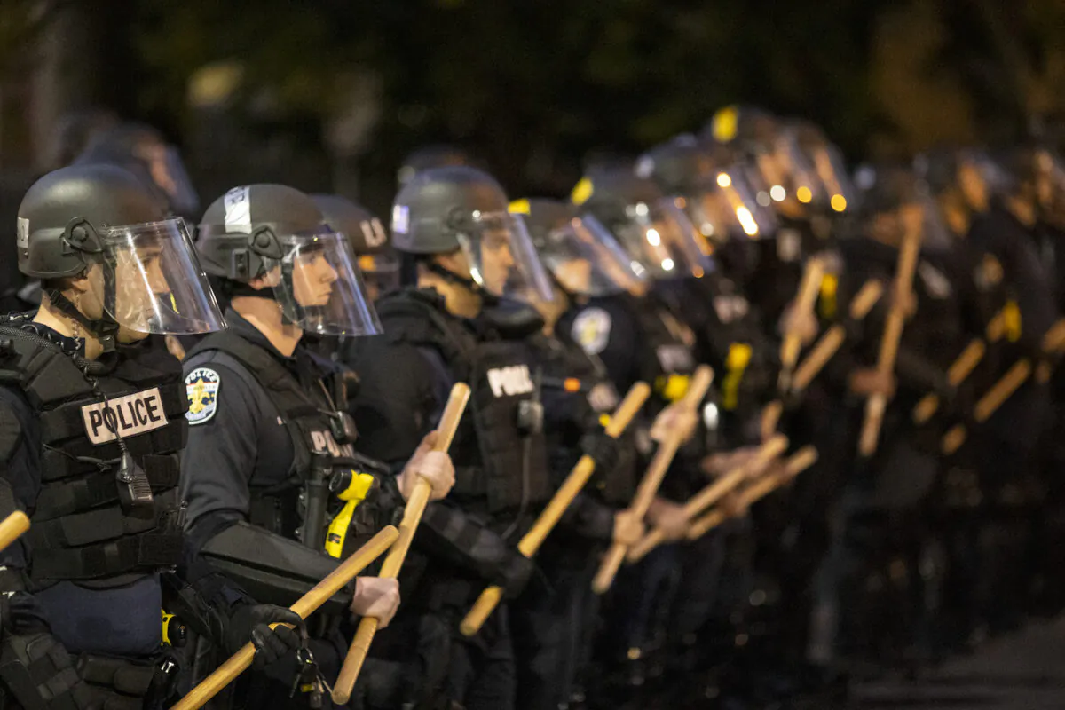 Police in riot gear stand in formation during protests in Louisville, Ky., on May 29, 2020. (Brett Carlsen/Getty Images)