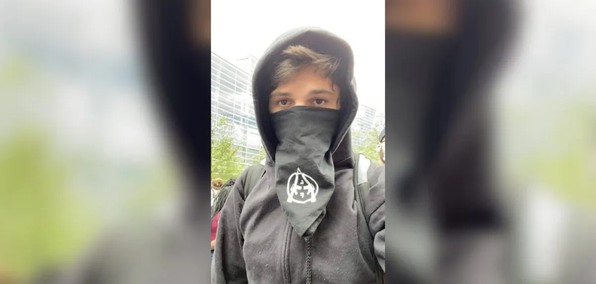 An anarchist identified as Brian Jordan Bartels was captured on video damaging a police car in Pittsburgh, Penn. (Pittsburgh Bureau of Police)