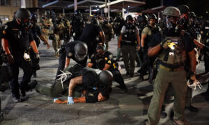 Atlanta Mayor: 2 Officers Fired in 'Excessive Force' Arrests