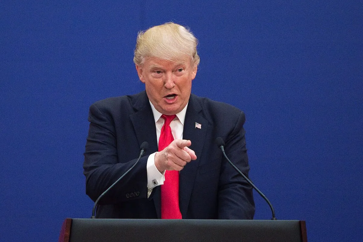 President Donald Trump speaks inside the Great Hall of the People in Beijing on Nov. 9, 2017. (Nicolas Asfouri/AFP via Getty Images)