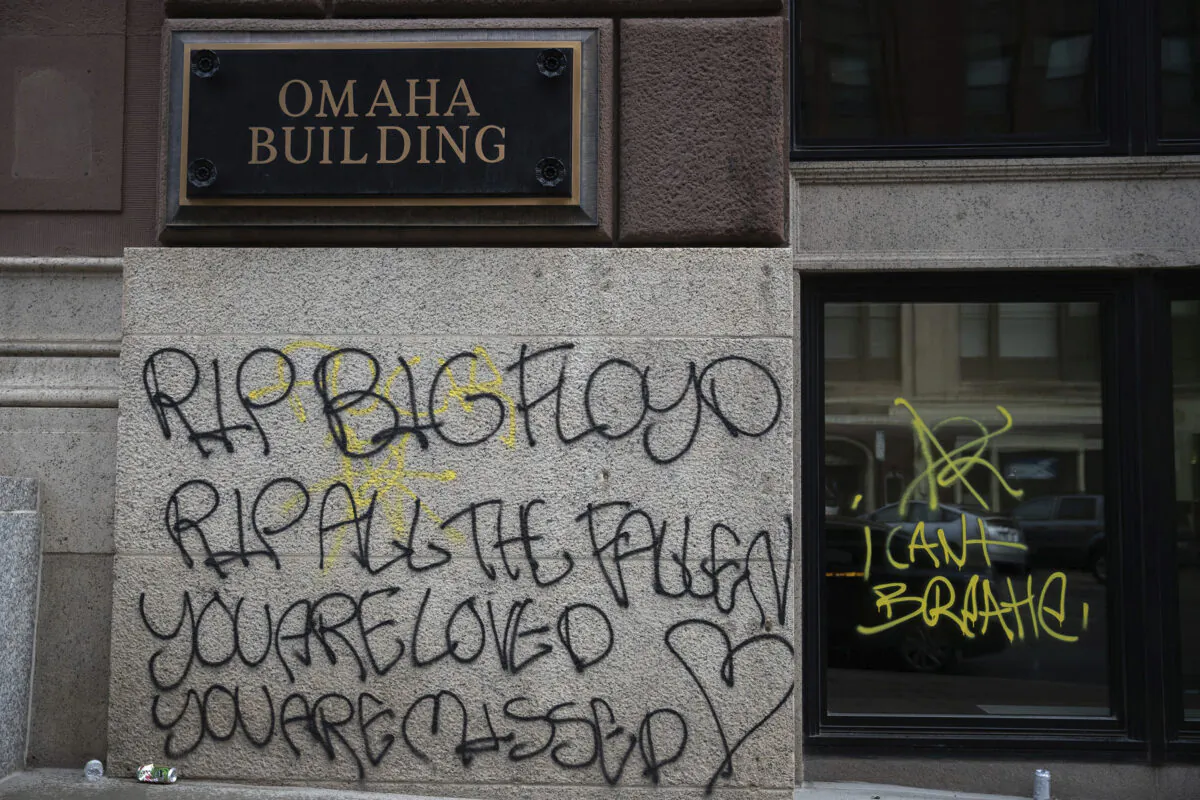 Graffiti in downtown Omaha, Neb., May 31, 2020. (Anna Reed/Omaha World-Herald via AP)
